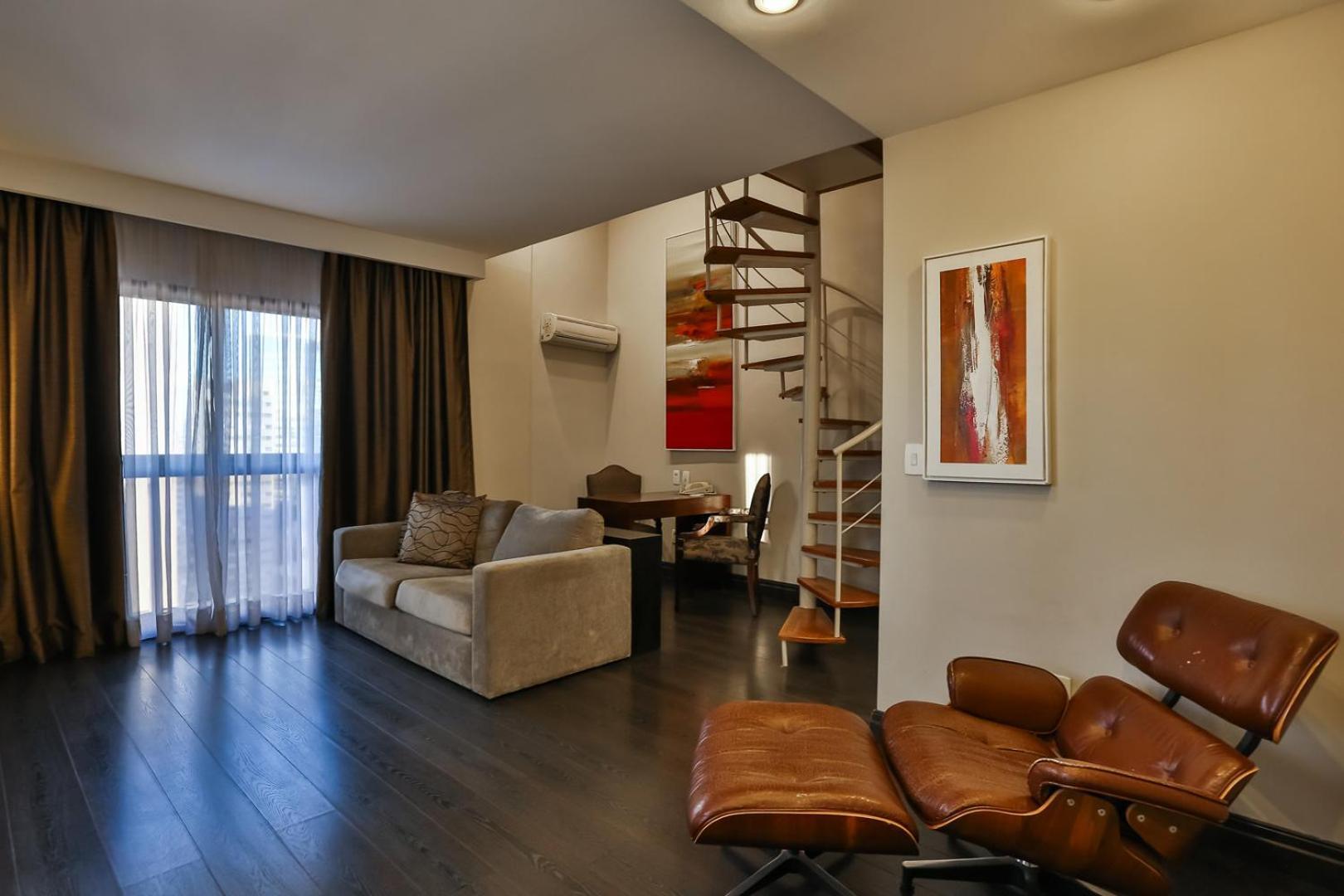 Double Tree By Hilton Sao Paulo Itaim Ξενοδοχείο Εξωτερικό φωτογραφία A living room with a spiral staircase